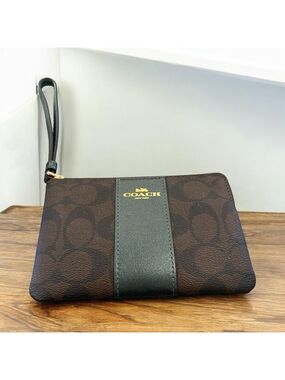 Coach signature C coated canvas wristlet w dark brown stripe Gold embossed logo